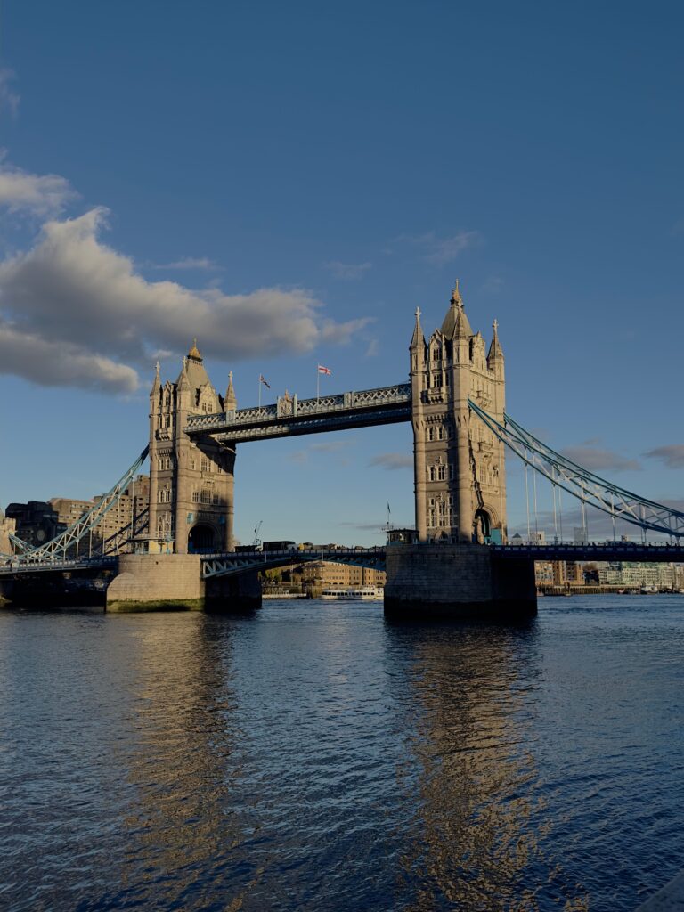 Stunning view of London's Tower Bridge spanning the River Thames during the day.